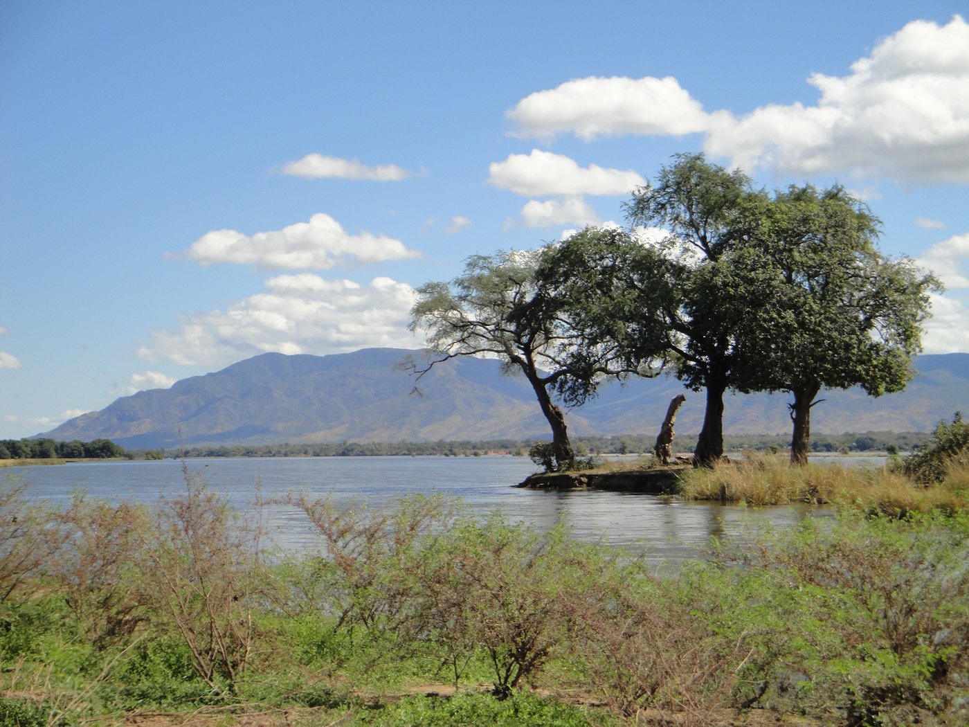Looking across the Zambezi to the Zambian escarpment from the Mana Pools river frontage, where Nyamepi Camp sits